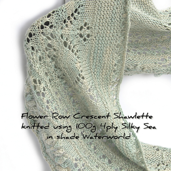 Flower Row Crescent Shawlette knitted in shade Waterworld