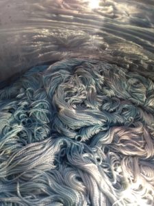Dye pot of yarns in colourway Waterworld